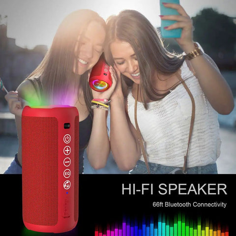 Two women enjoying music with 24W Bluetooth Speaker With Deep Bass And Dual Pairing, IPX7 Waterproof, Bluetooth 5.3, LED Lights, 30 Hour Playtime.