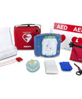 Philips HeartStart OnSite AED defibrillator in blue with red carrying case and kit accessories.