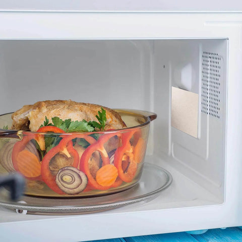 Microwave with installed heat resistant mica sheet panel showing food inside, part of 10 pack insulation mica panels