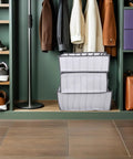 Total Closet Game Changer 3 Pack Seven Grid Foldable Bins With Grippy Handles in closet for organized storage.