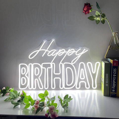 Big Birthday Neon Sign For Wall Decor With Dimmer Switch, 12V Reusable Light Up Birthday Party Decoration on tabletop with plants
