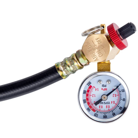 Heavy Duty Shop Tested brass air tank manifold assembly valve with pressure gauge and black hose.