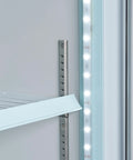 Detail of Heavy Duty Triple Glass Door Upright Freezer Merchandiser In Crisp White with LED lighting and shelf support.