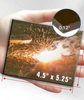 Person holding 4.5 by 5.25 inch welding glass lens pack of 2 hardened glass shield for helmets with sparks image