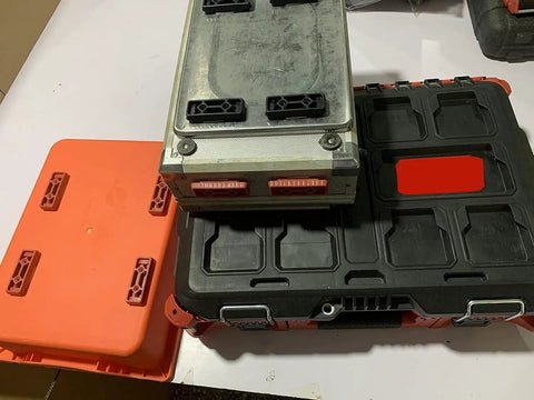 Heavy Duty Mounting Feet For Packout System shown on tool carriers with black ABS feet installed, top view