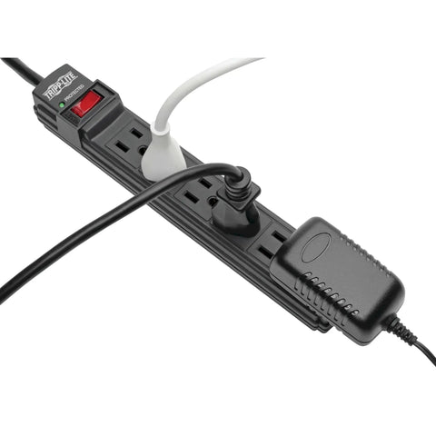 Six Outlet Surge Protector Power Strip With Six Foot Cord Black plugged in with various devices