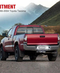 Rear view of a red Toyota Tacoma 1995-2004 with License Plate Lights For Toyota Tacoma 1995 1996 1997 1998 1999 2000 2001 2002 2003 2004 Black Housing 6000K White LED 2 Pack Non Polarity Plug And Play illuminated at dusk