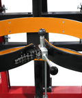 Close-up of Heavy Duty Drum Lifter And Rotator Tool showing the solid steel jaw clamp and black polyurethane wheels mechanism.