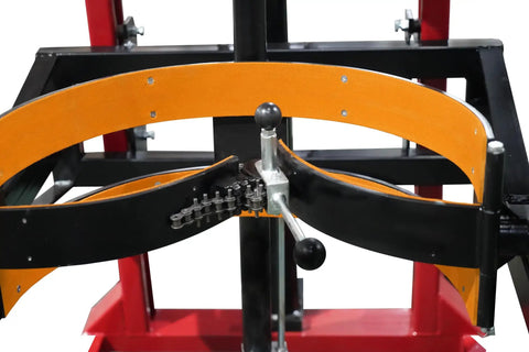 Close-up of Heavy Duty Drum Lifter And Rotator Tool showing the solid steel jaw clamp and black polyurethane wheels mechanism.