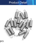 Group of 15 stainless steel dual-hook tension springs with coiled bodies