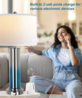 Set Of 2 Ombre Indigo Glass Table Lamps With USB Ports, LED Bulbs Included, woman using phone, USB charging in living room