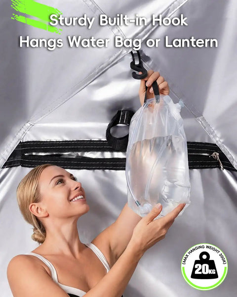 Person hanging water bag inside Go To Portable Shower Tent With Mesh Floor Carry Bag Easy Setup Lightweight Privacy Changing Room