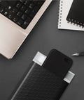 4x8 Black Bubble Mailers 260 Pack Self Seal Padded Envelopes for Shipping Small Biz Gear with phone on a desk scene