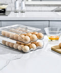 Two Layer Ramp Type Auto Rolling Egg Holder For Fridge Organizer Large Clear Egg Bin Stackable Egg Storage Tray With Front Load Roll Forward Design For Easy Access Daily Use on kitchen counter