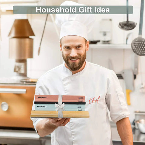Actual Grit Whetstone Set With 400 1000 3000 8000 Grits held by chef in kitchen, featuring silicon carbide stones with bamboo base.