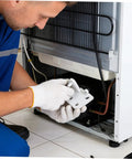 Person installing Rock Solid Metal Refrigerator Lower Hinge Assembly Two Piece Set for freezer door repair.