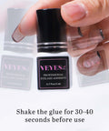 Extra Strong Lash Extension Glue 5ml bottle being held, label showing professional eyelash adhesive, instruction to shake before use