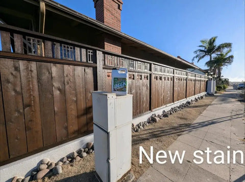 Dark Walnut Wood Stain For Decks And Fences on a fence, showcasing rich tone and durable exterior coating.