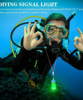 Diver underwater using an Underwater Signal Light For Diving IPX8 Submersible Beacon With Constant And Flashing Modes Blue Night Dive Light Mini Tank Marker for improved visibility.