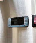 Digital temperature control display on Heavy Duty Commercial Reach In Upright Refrigerator With Slick Stainless Finish.