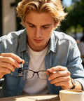 Man using Pro Grade Glass Repair Kit With Precision Applicator 10ml Clear Resin Restorer on glasses outdoors.