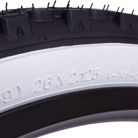 Close-up of 26 Inch White Wall Bicycle Tires For Beach Cruiser And Cruiser Bikes With Or Without Tubes 2 Pack Includes Tire Levers And Upgraded Replacement Parts For A Killer Ride, showing sidewall details and size markings.