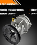 Brake vacuum pump front view; aluminum housing, black pulley, brass inlet valve.