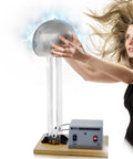 Woman demonstrating Van De Graaff Generator Motor Driven 120 To 240V 50 To 60Hz Includes Assembled Base With DC Motor, 22 in tall.