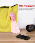 bqover pink silicone bag charm with 8x8 in microfiber cleaning cloth, attached to yellow tote bag
