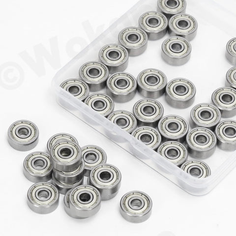 Top view of 72 high-carbon steel miniature ball bearings in a clear plastic case; six sizes.