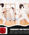 Fencing Gear Tester Box For Foil And Epee Training And Gear Repair with fencers practicing in the background.