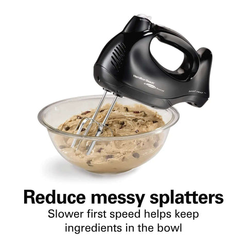 Big Time Slick And Kickin Six Speed Electric Hand Mixer With Quick Burst Function in a mixing bowl with cookie dough.