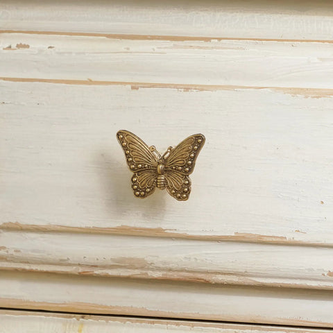 Close-up of 2 Pack Butterfly Cabinet Knobs In Gold Pewter with intricate details, perfect for girls room dresser vanity hardware.