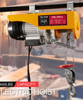 Heavy Duty 440 Lb Electric Hoist And Winch Kit With Remote Control 120V Lift System in a workshop setting