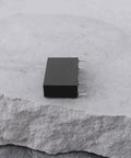 12V DC Relay Module With SPST NO Contact, 5A 250V AC Load Switching, G5NB 1A E 12VDC Version on a stone surface