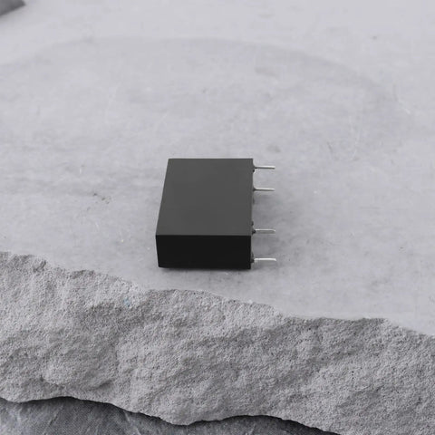 12V DC Relay Module With SPST NO Contact, 5A 250V AC Load Switching, G5NB 1A E 12VDC Version on a stone surface
