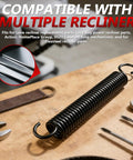 Heavy Duty Replacement Recliner Springs 4 7 8 Inch Extension Hardware Featuring Three Quarter Offset Hooks And Twenty Nine Coils on workbench with tools.