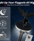 All In One 5 Foot Flag Pole Kit For Outdoor Home Use With American Flag And Solar Light showing solar LED light at night