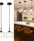 Karjearl Glass Pendant Lights Kitchen Island, 2 Pack Black Hanging Lighting in modern kitchen with layered glass design.