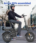 Person riding Folding Electric Bike For Adults And Teens, 750W Peak Motor, 14 inch foldable ebike in urban setting