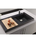 Modern kitchen sink with cutting board and fruit in upscale kitchen setting