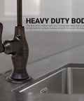 Close-up of No Airgap NSF Certified RO Faucet For Clean Drinking Water in Venetian Bronze next to kitchen sink countertop.
