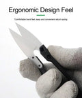Ceramic Insulated Scissors Heavy Duty Wire Cutters Safe For Live Circuits Razor Sharp Lightweight Rustproof Snips held by a hand with gloves.
