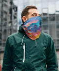 Flex Your Outdoor Setup With This Ultra Breezy Stretchy Neck Gaiter That Shields You From Blazing Sun And Frosty Winds While Keeping You Fresh For Running Or Snowboarding, shown on a man in a green jacket.