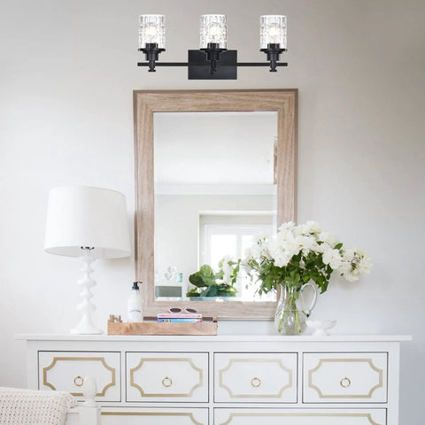 3 Light Black Matte Finish Vanity Light With Dope Clear Grid Glass Shade for Bathroom Mirror and Vanity Modern Farmhouse Wall Fixture E26 Base Durable Kitchen and Powder Room Lighting displayed above a mirror in a stylish bathroom setting.