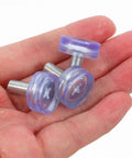 Close-up of Adjustable Furniture Feet Set With M6 Threaded Screws, 18mm PVC and metal levelers held in hand, 40 pieces set