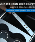 Close-up of Tesla Model Y center console USB hub charger with 3 fast charging ports, showing easy install and OEM style fit.