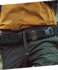 Person wearing Six Piece Durable Nylon Belt Buckles For Camping Gear With Quick Release Design For Fast Attachment And Secure Hold High Load Capacity For Outdoor Training Hiking And Adventure Equipment on waist belt.