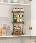 3 Tier Rotating Lazy Susan Spice Rack With Adjustable Height For Cabinet Pantry And Kitchen Counter Quick Glide Smooth Turn Heavy Duty Seasoning Holder in use inside cupboard.