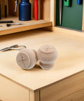 2-Piece Solid Wood Table Leg Set with 3-Inch Unfinished Bun Feet on workbench